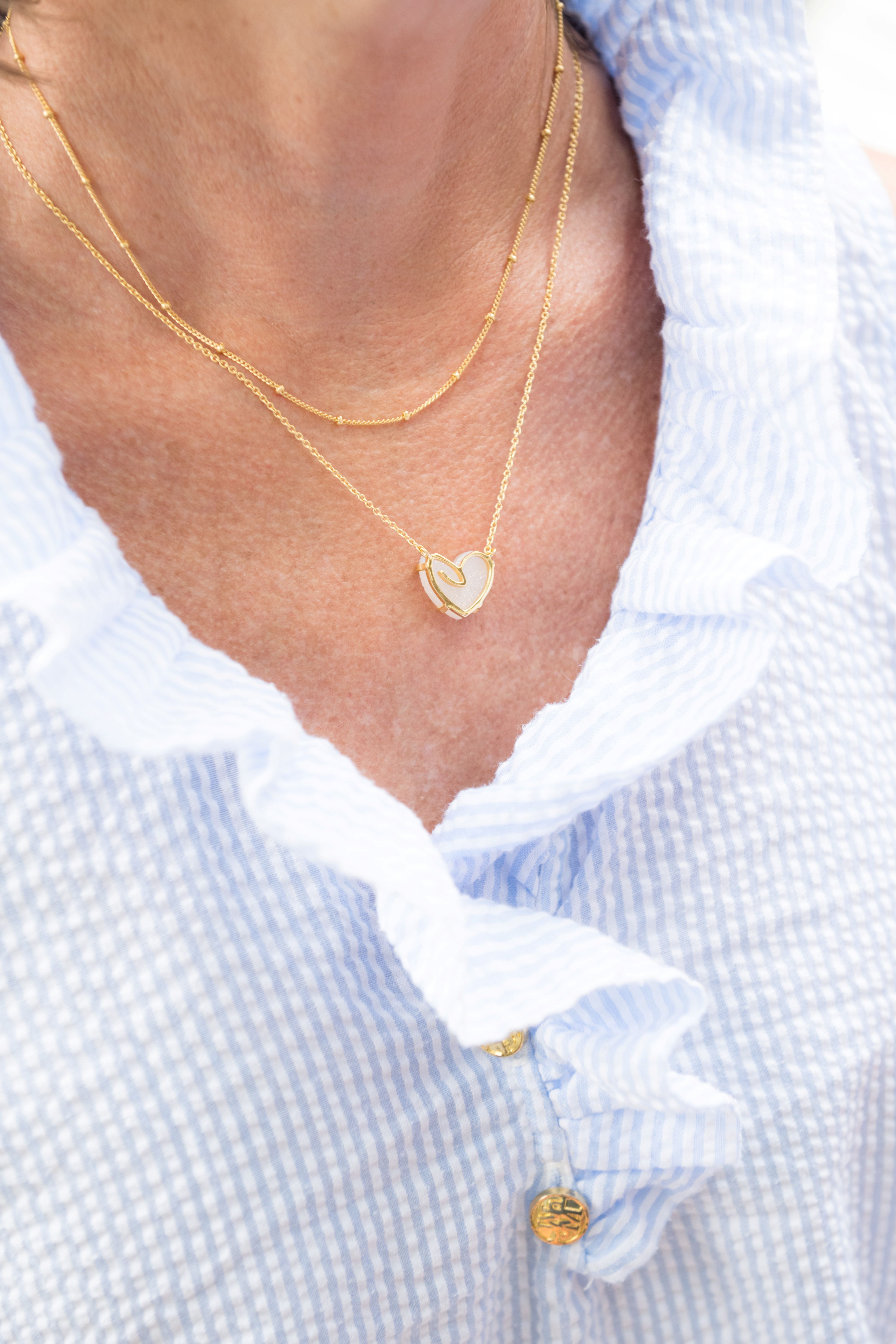 Open Heart Heron Wing Necklace